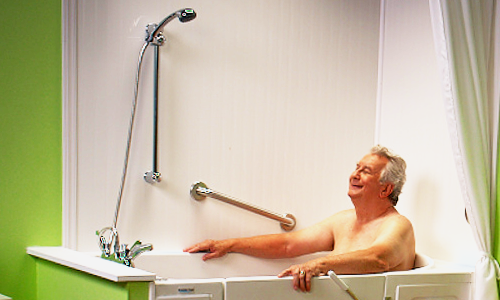 Enjoying his new Premier Bath Premier Walk In Bath Happy Customer